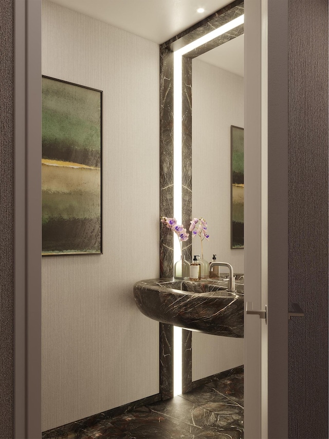 bathroom featuring marble finish floor