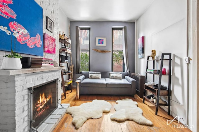 sitting room featuring light hardwood / wood-style flooring