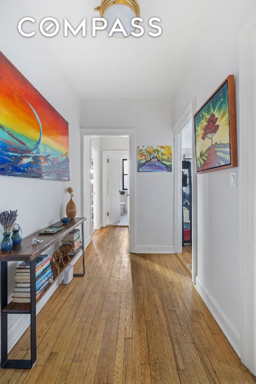 hall featuring hardwood / wood-style flooring