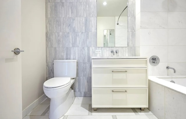 full bathroom with shower / bathtub combination, vanity, toilet, and tile walls