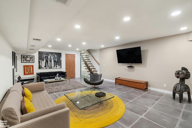 living area featuring stairs, recessed lighting, visible vents, and baseboards