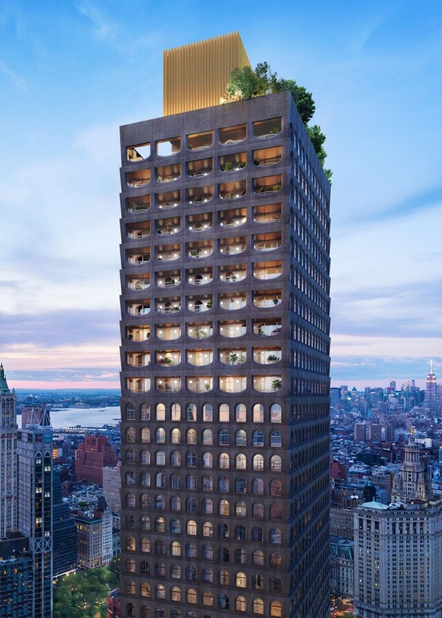 view of outdoor building at dusk