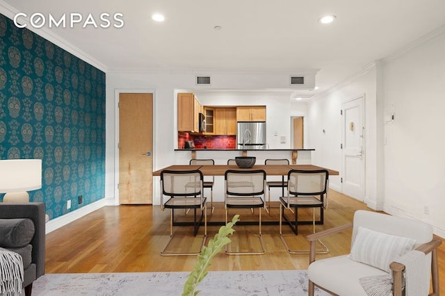 85 Hudson Ave Unit 2A, New York City, NY 11201 - living room with light wood-style flooring, crown molding, recessed lighting, baseboards, and wallpapered walls