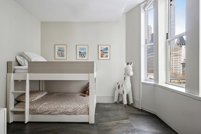 bedroom featuring multiple windows