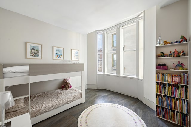 bedroom featuring dark hardwood / wood-style floors