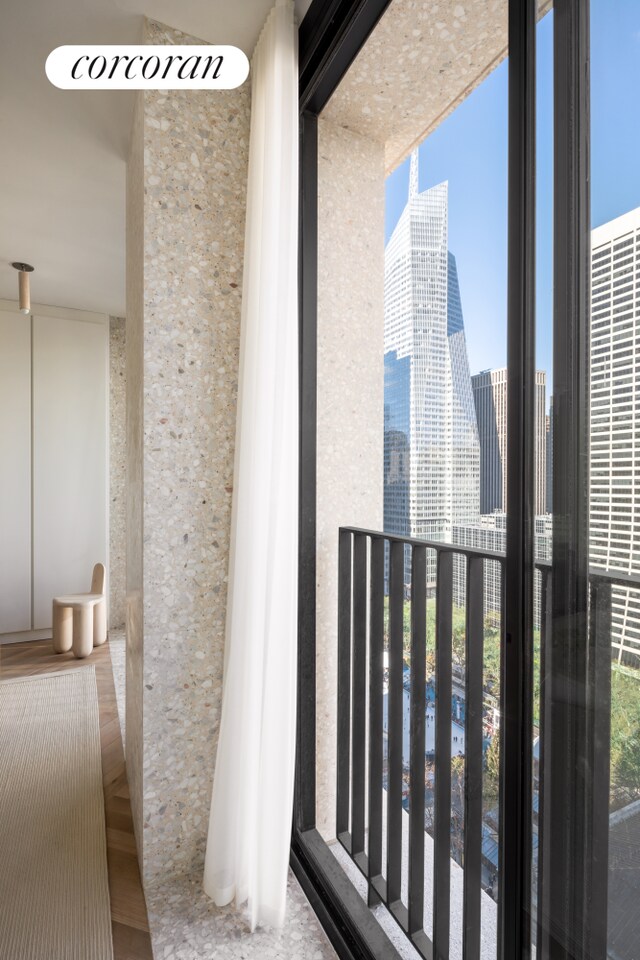 bedroom featuring a wall of windows