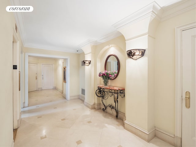 hallway featuring light tile patterned floors, baseboards, visible vents, and crown molding