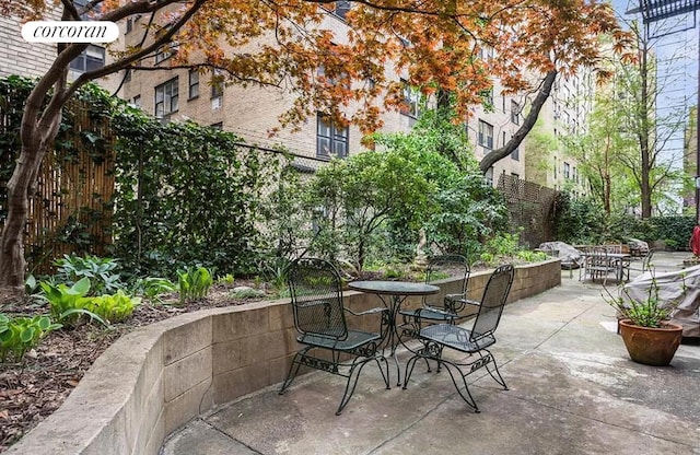view of patio / terrace with fence and outdoor dining area