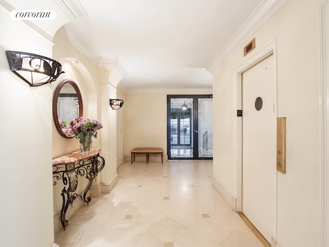 corridor featuring crown molding, light tile patterned flooring, baseboards, and visible vents