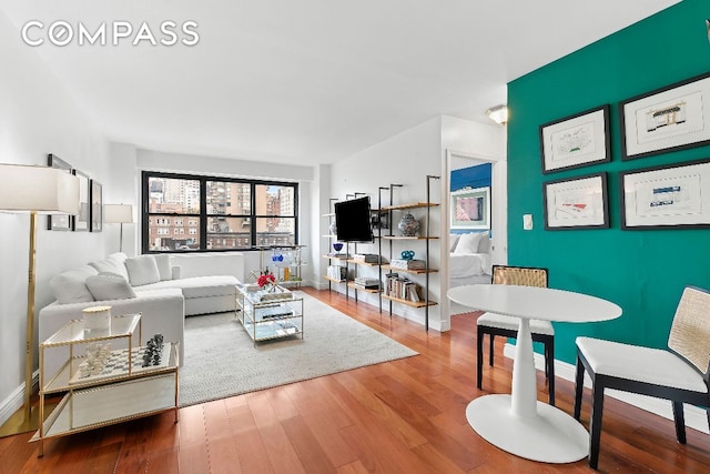 living room with hardwood / wood-style flooring