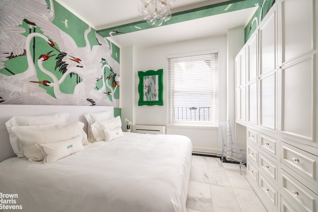bedroom with ornamental molding