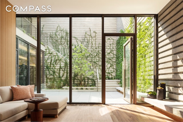 entryway featuring floor to ceiling windows