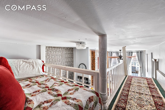 bedroom featuring a textured ceiling