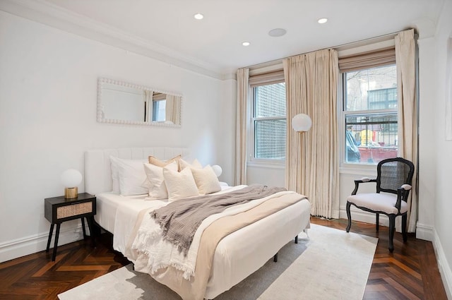 bedroom with ornamental molding, recessed lighting, and baseboards