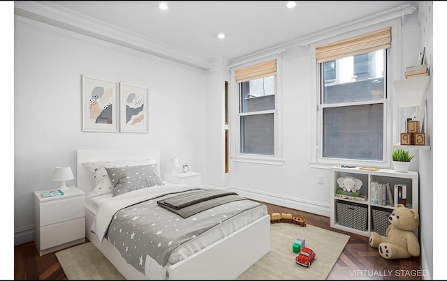 bedroom with ornamental molding, baseboards, and recessed lighting