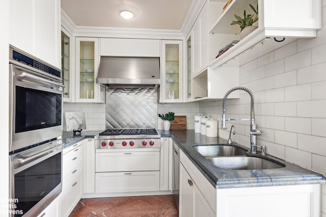 kitchen with extractor fan, stainless steel appliances, a sink, white cabinets, and open shelves