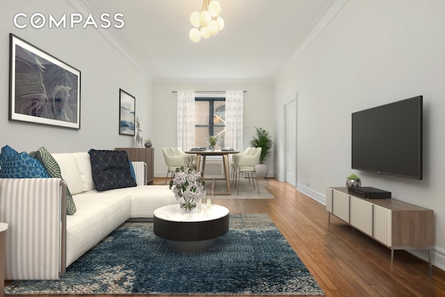 living area featuring ornamental molding, a notable chandelier, baseboards, and wood finished floors