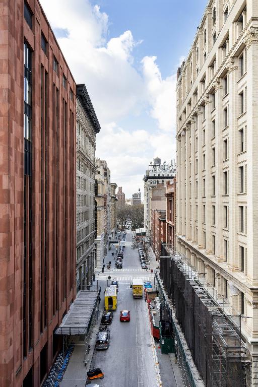 view of street featuring a city view and sidewalks