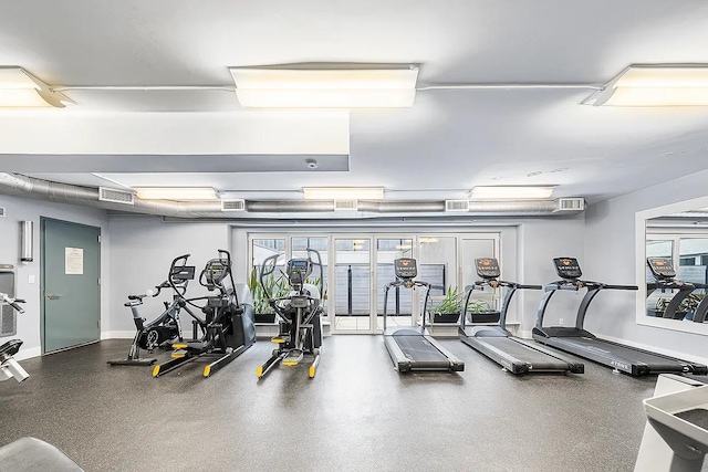 gym featuring visible vents and baseboards