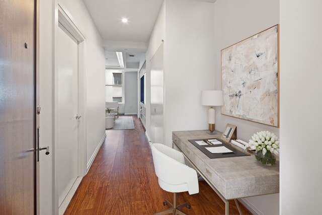 office with dark hardwood / wood-style floors