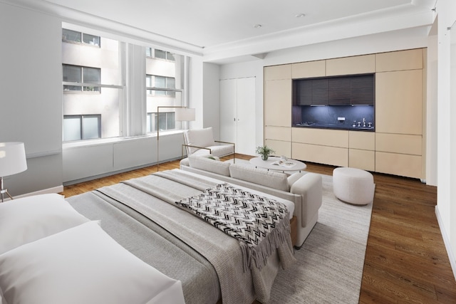 bedroom featuring hardwood / wood-style flooring