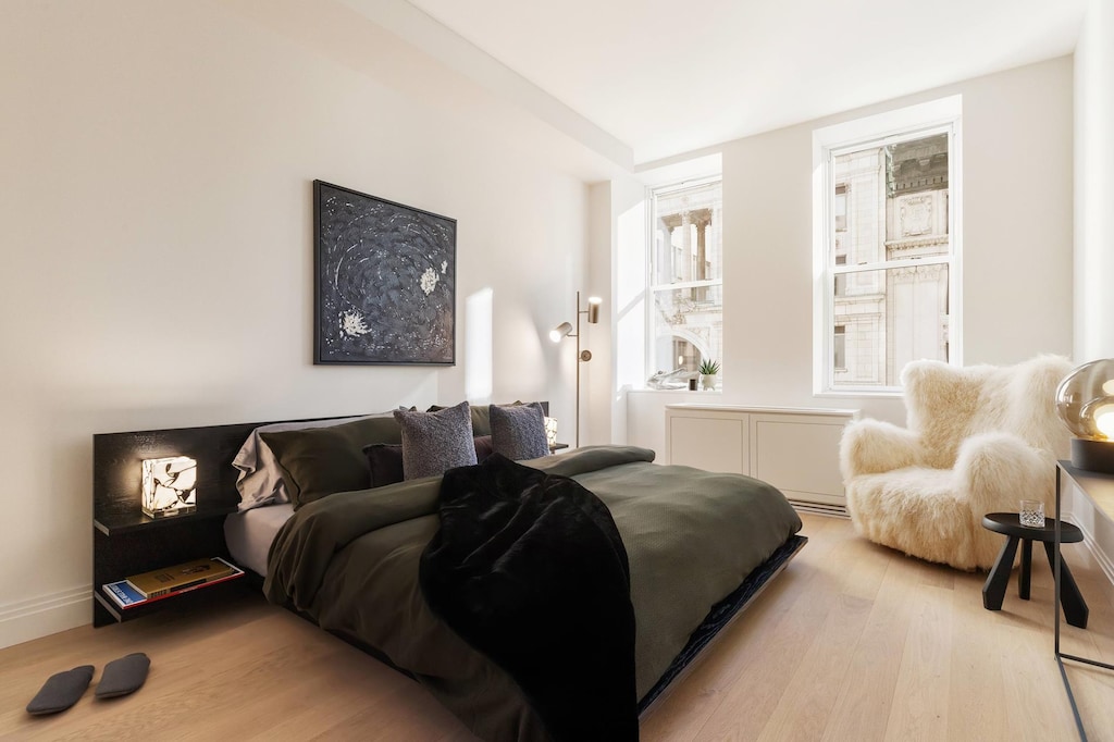 bedroom featuring light wood-style flooring