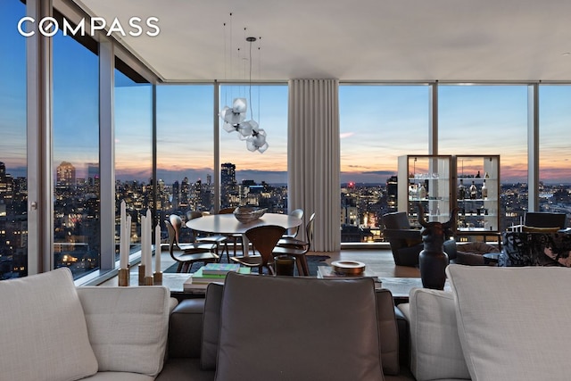 living room featuring a view of city and expansive windows