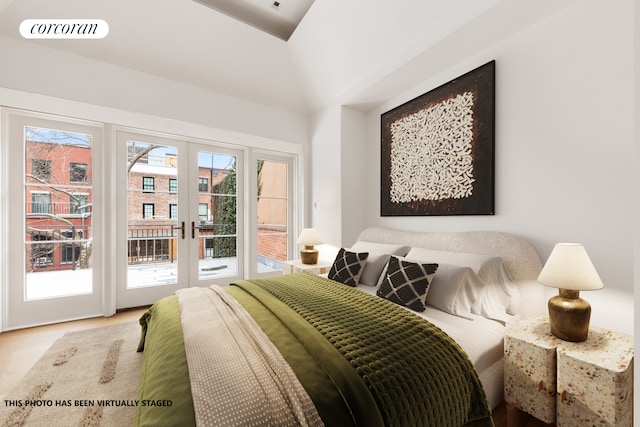 bedroom featuring french doors, visible vents, and access to exterior
