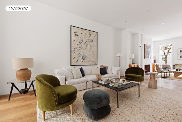 living room with light hardwood / wood-style flooring