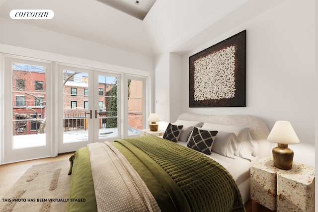 bedroom featuring access to exterior and french doors