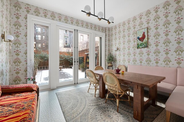 dining area with wallpapered walls