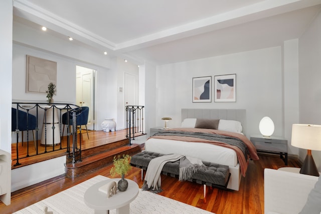 bedroom with hardwood / wood-style floors