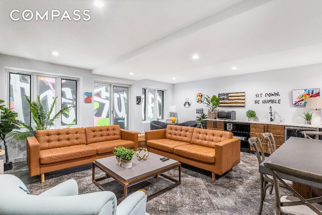 living room with beverage cooler and indoor bar