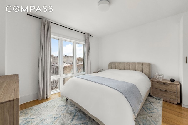 bedroom featuring light wood-type flooring