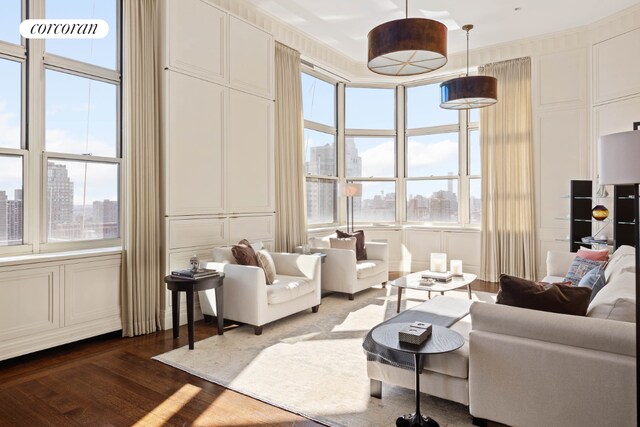 living room with dark hardwood / wood-style flooring