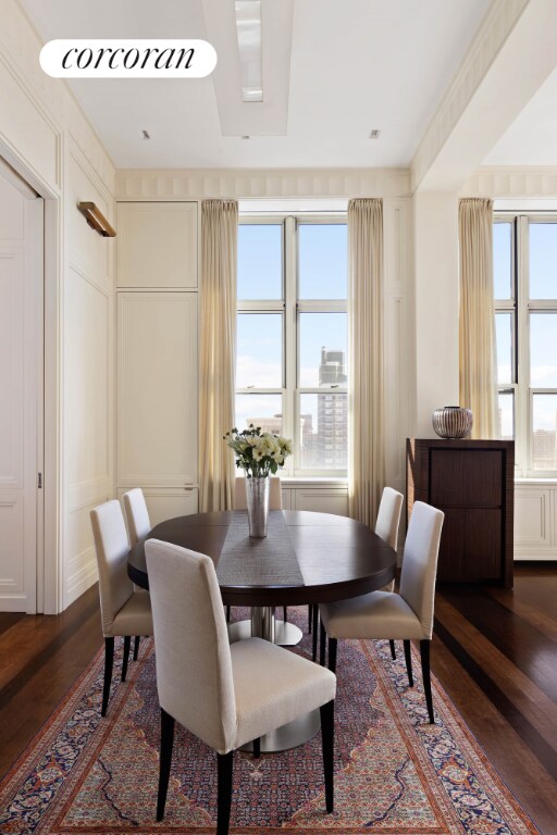 dining area featuring dark hardwood / wood-style flooring and a wealth of natural light