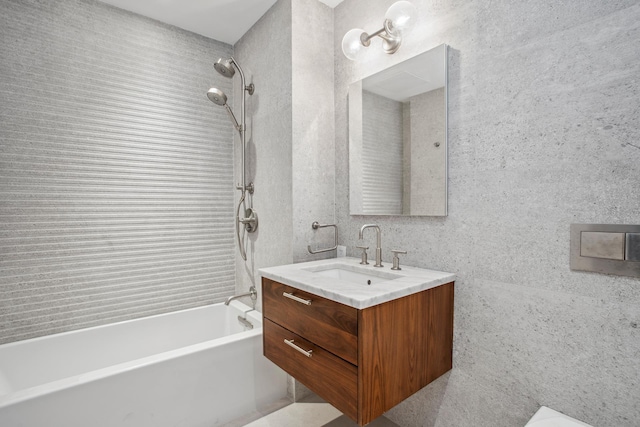 bathroom with bathtub / shower combination and vanity