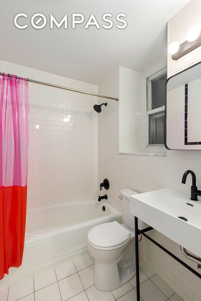 bathroom featuring tile patterned flooring, tile walls, shower / tub combo, and toilet