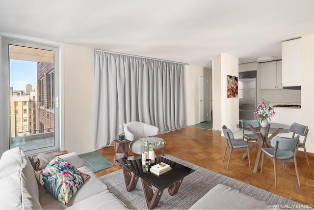 living room with parquet flooring