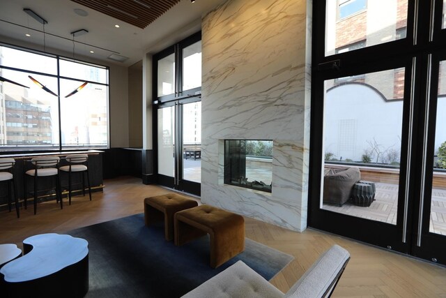 common area featuring a high ceiling and recessed lighting