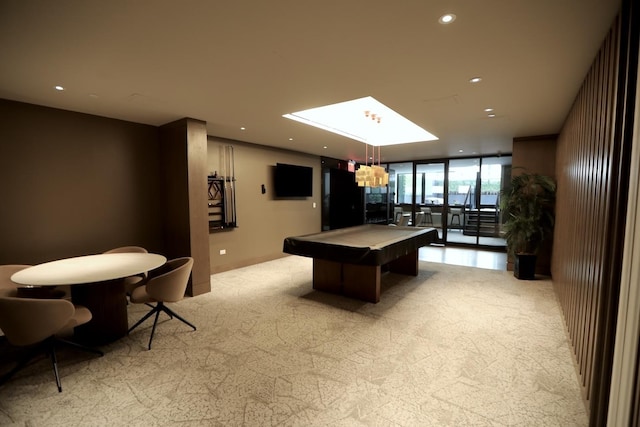 rec room featuring pool table, floor to ceiling windows, light colored carpet, recessed lighting, and a skylight