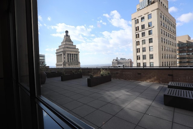 view of patio / terrace featuring a view of city