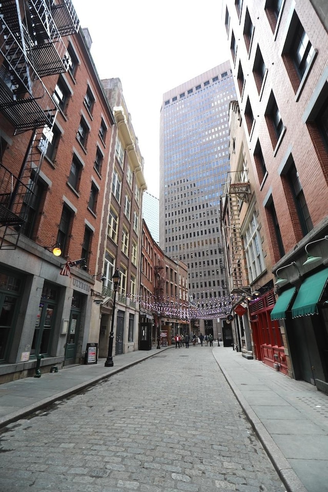 view of street featuring curbs and sidewalks