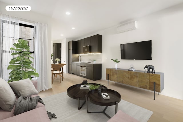 living room featuring light wood-type flooring and a wall unit AC