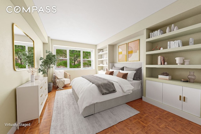 bedroom featuring parquet flooring