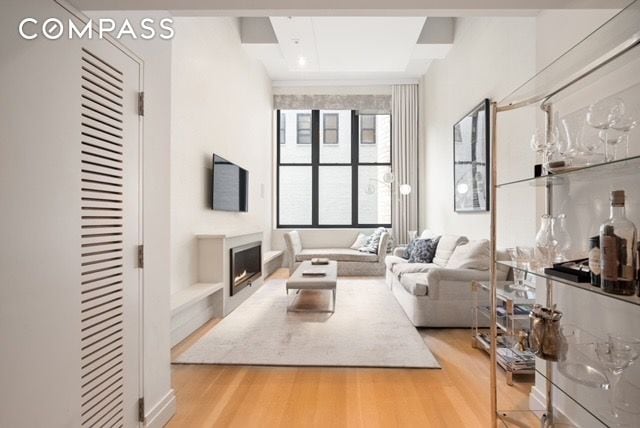 living room with light hardwood / wood-style floors