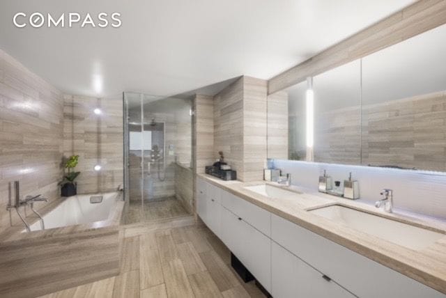 421 Hudson St Unit 320, New York City, NY 10014 - full bath with double vanity and a bath