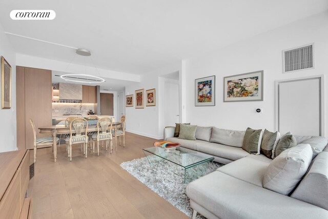 living room featuring light wood-type flooring