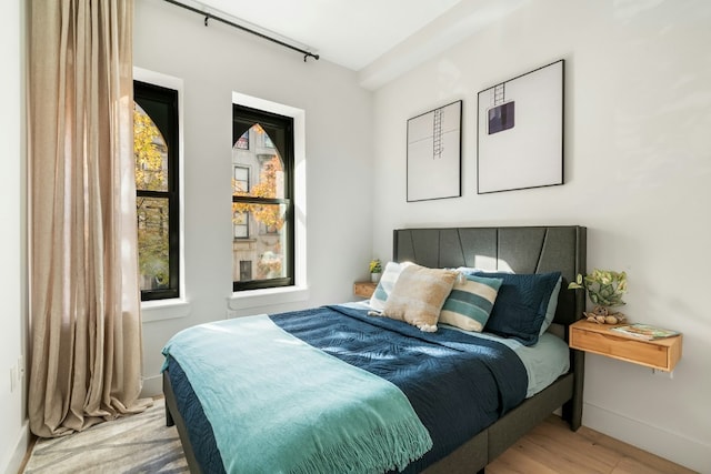 bedroom with light hardwood / wood-style flooring