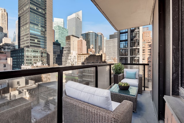 balcony featuring a view of city